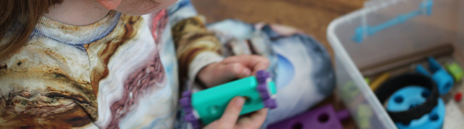 Child Playing With Kids First Automobile Engineering Kit