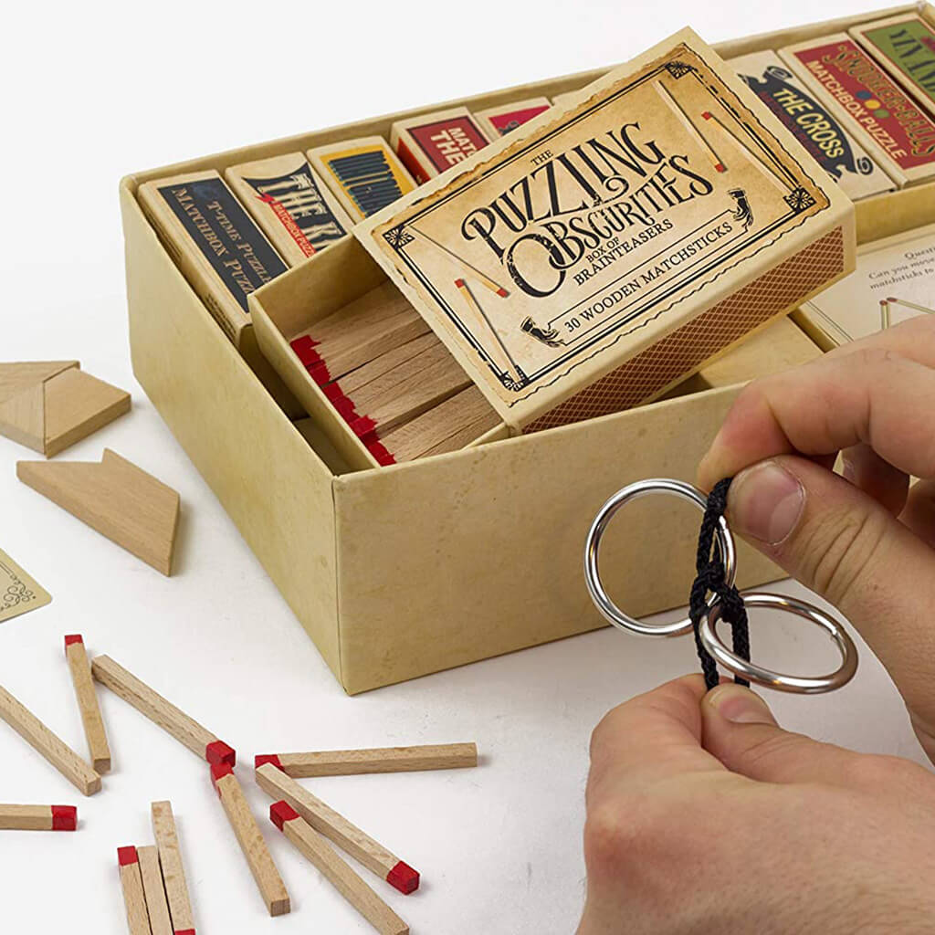 Puzzling Obscurities: 10 Pocket-Sized Matchbox Puzzles - Professor Puzzle